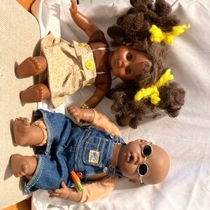 Just precious,Set of 2 very young black children hanging out n having a snack